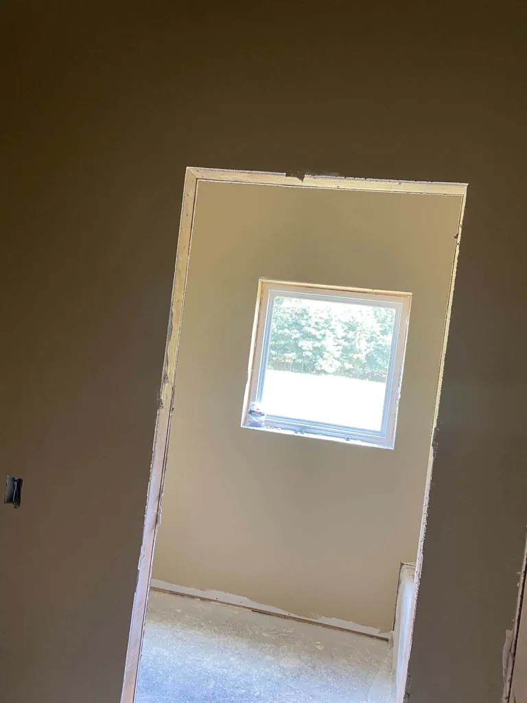 Finished doorway opening and window detail in new construction